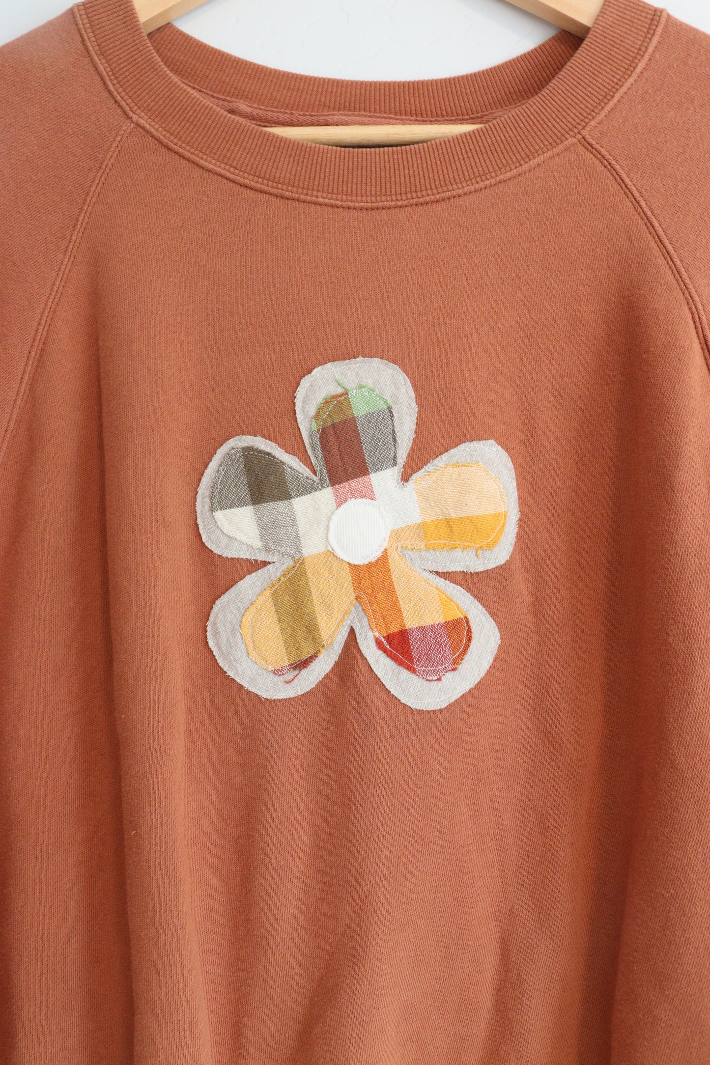 Burnt orange flower sweatshirt MEDIUM